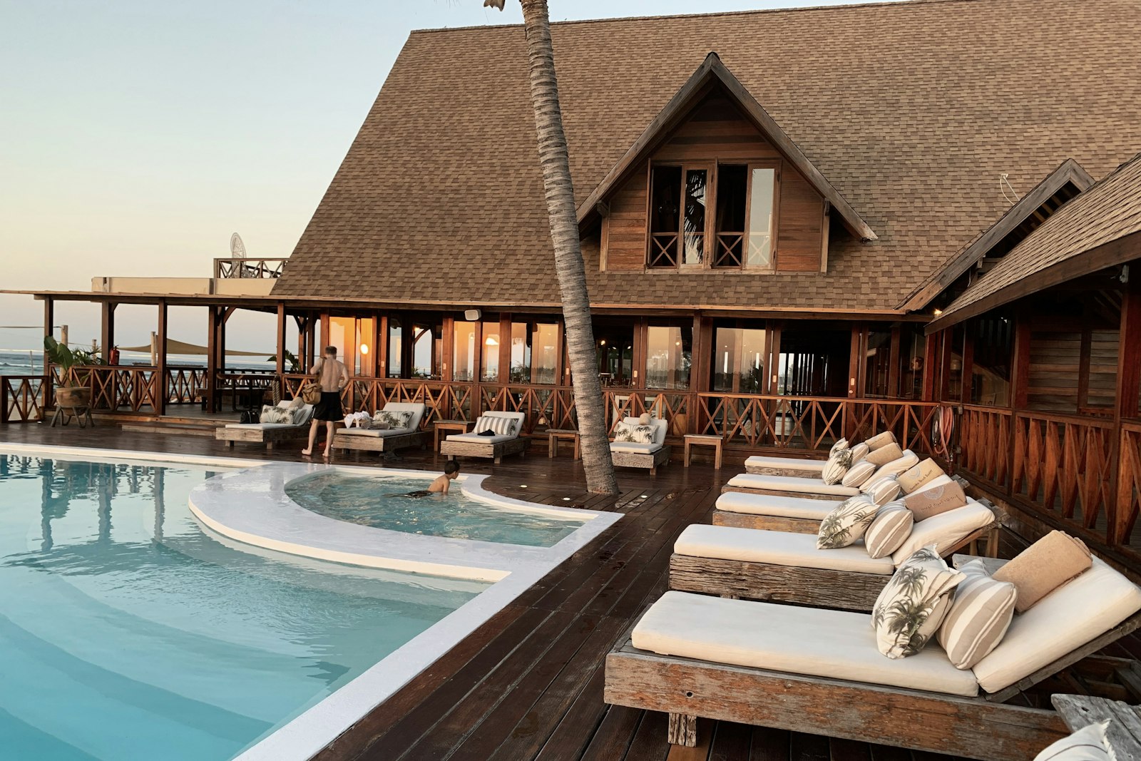 Resort pool and lodge ready for peak-season guests