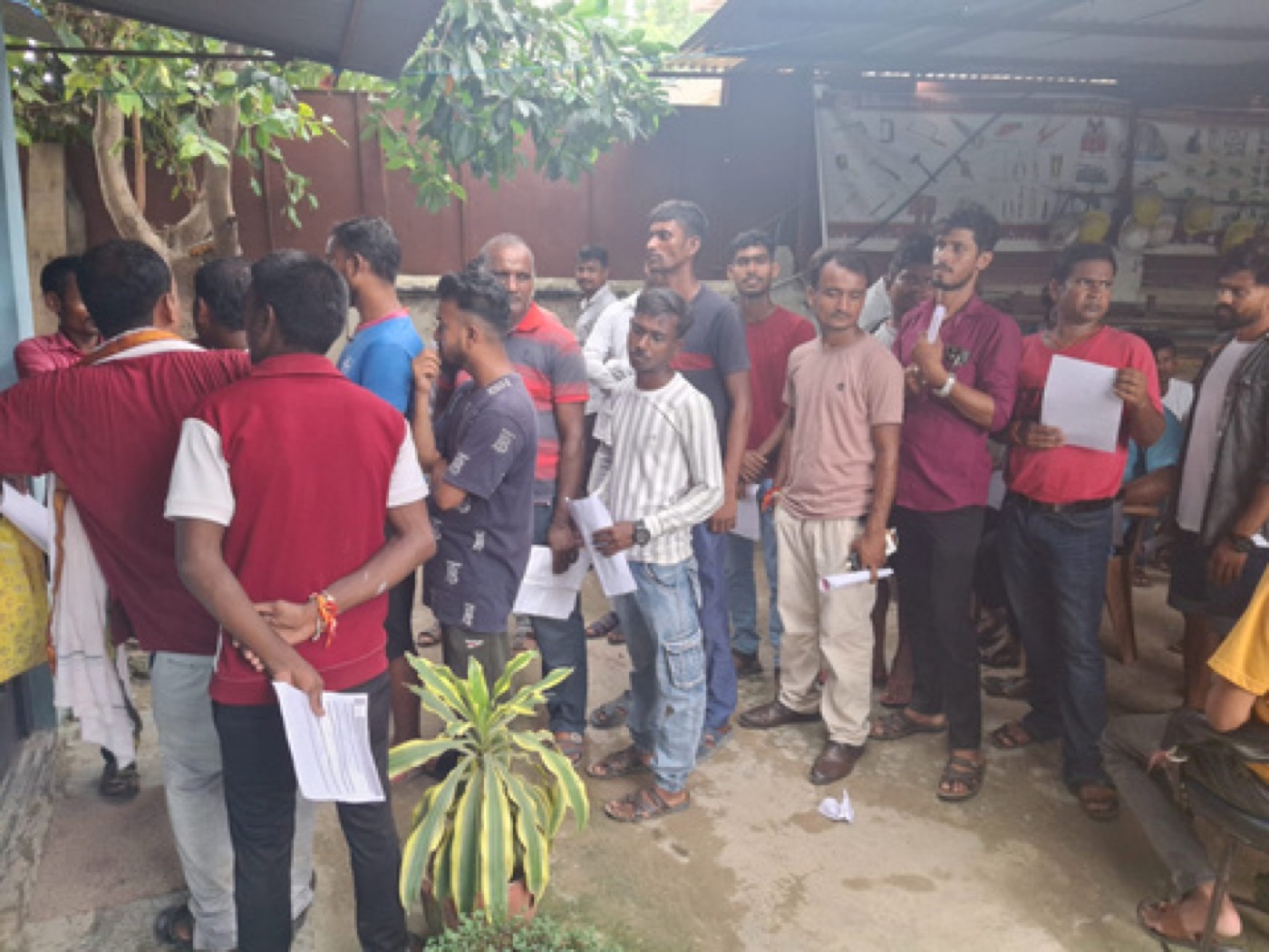 Candidates queued with documents during pre-departure processing